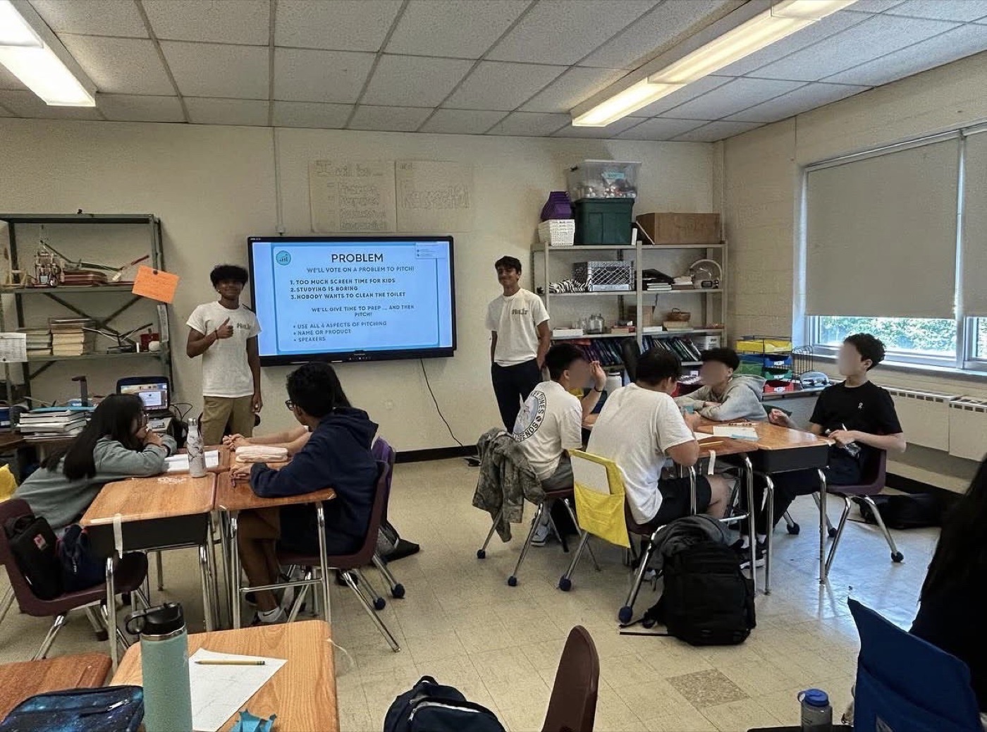 Futures Financials volunteers leading a pitch workshop in a classroom